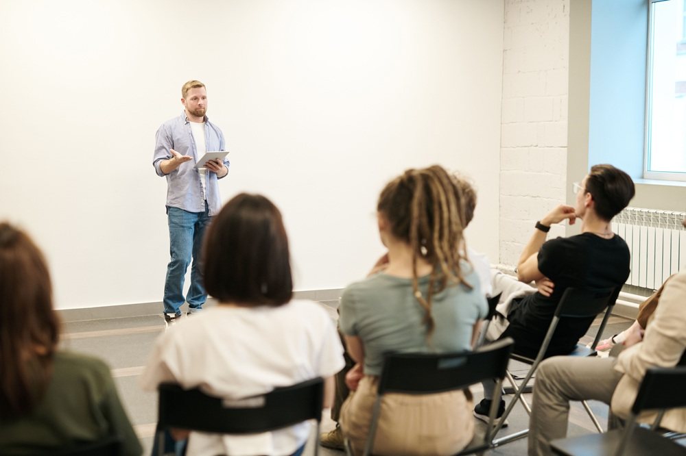 Trainer leading a teacher training workshop